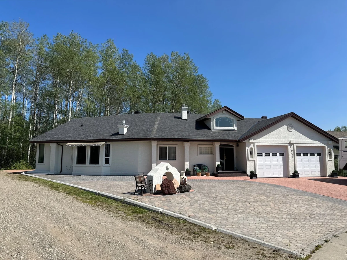 Shingle roof on a house with an attached garage