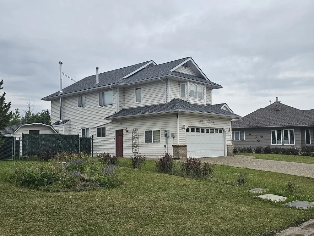 Completed roof replacement on a Peace Region family home